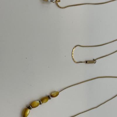 Egg yolk amber and CZ pendant