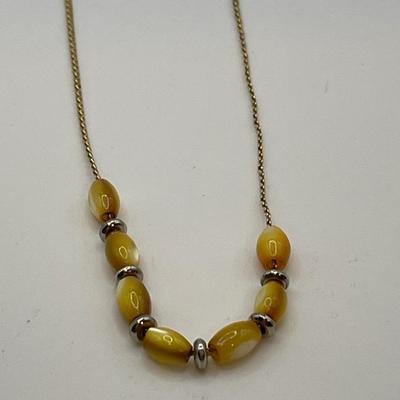 Egg yolk amber and CZ pendant