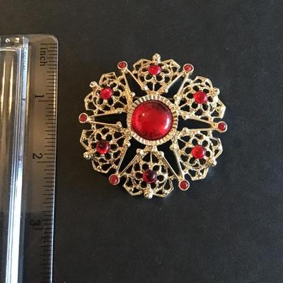 Sale Photo Thumbnail #115: Vintage Sarah Coventry serenade gold tone brooch with red glass cabochons and rhinestones 1970 era Please see attached photos