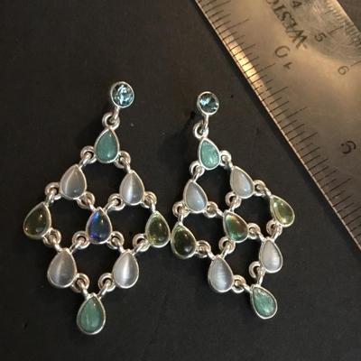 Beautiful statement, earrings, silver toned