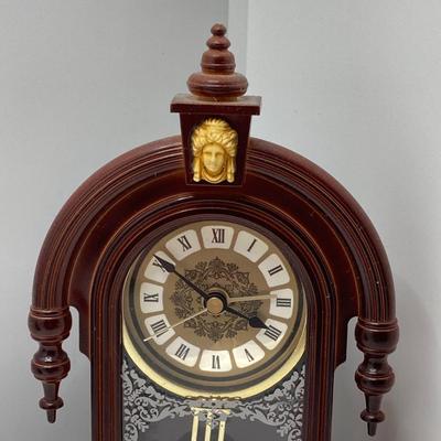 LOT 45: Pair of Miniature Wall Clocks (M.I. Hummel Stormy ARS Sacra 9743 / Plastic Battery Operated with Four Pine Cone Weights