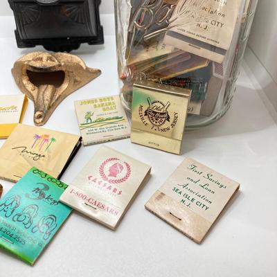 LOT 47: Vintage Cast Iron Hanging Match Holder, Gargoyle / Devil Face Bottle Opener and Glass Jars (Ball / Kerr) filled with Matchbooks