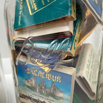 LOT 47: Vintage Cast Iron Hanging Match Holder, Gargoyle / Devil Face Bottle Opener and Glass Jars (Ball / Kerr) filled with Matchbooks