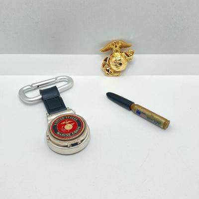LOT 48: Vintage Militaria / Marines Collection - Baron Brass Belt Buckle, Key Chain / Watch, Souvenir Pen, USMC Mug and Matchbooks