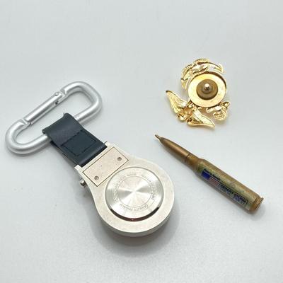 LOT 48: Vintage Militaria / Marines Collection - Baron Brass Belt Buckle, Key Chain / Watch, Souvenir Pen, USMC Mug and Matchbooks