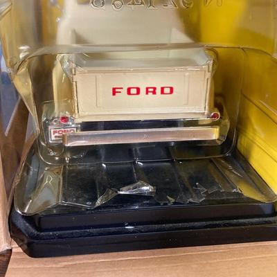 LOT 49: Diecast 1953 Ford F-100 Pick Up in Original Box and Wings of Texaco Diecast "The Duck" 1936 Keystone - Loening Commuter...