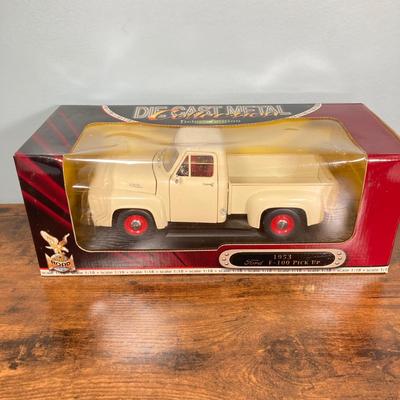 LOT 49: Diecast 1953 Ford F-100 Pick Up in Original Box and Wings of Texaco Diecast "The Duck" 1936 Keystone - Loening Commuter...