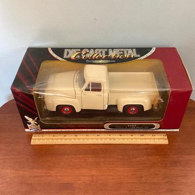 LOT 49: Diecast 1953 Ford F-100 Pick Up in Original Box and Wings of Texaco Diecast "The Duck" 1936 Keystone - Loening Commuter...