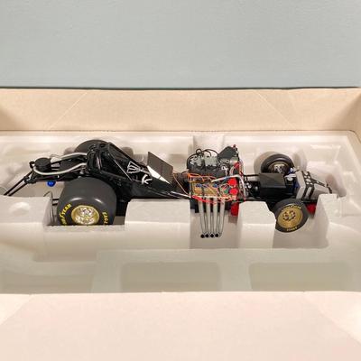 LOT 50: Action Collectibles 1:16 Scale John Force Castrol GTX Funny Car with Fiberglass Body (High Mileage Three Stooges 75th Anniversary