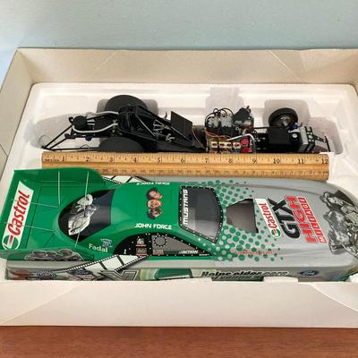 LOT 50: Action Collectibles 1:16 Scale John Force Castrol GTX Funny Car with Fiberglass Body (High Mileage Three Stooges 75th Anniversary