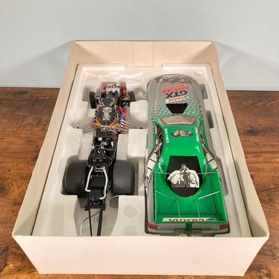LOT 50: Action Collectibles 1:16 Scale John Force Castrol GTX Funny Car with Fiberglass Body (High Mileage Three Stooges 75th Anniversary