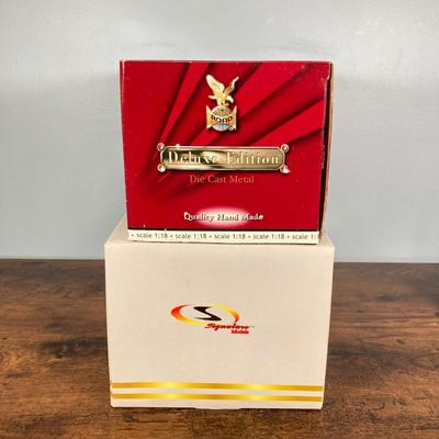 LOT 53: Diecast Collectible Cars in Original Boxes - Excellence 1965 Alfa Romero Giulia Sprint GTA and Sun Star 1963 Studebaker Avanti