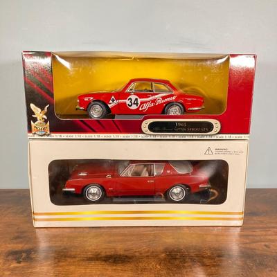 LOT 53: Diecast Collectible Cars in Original Boxes - Excellence 1965 Alfa Romero Giulia Sprint GTA and Sun Star 1963 Studebaker Avanti