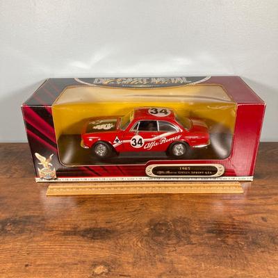 LOT 53: Diecast Collectible Cars in Original Boxes - Excellence 1965 Alfa Romero Giulia Sprint GTA and Sun Star 1963 Studebaker Avanti