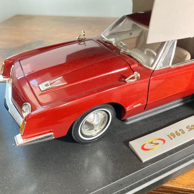 LOT 53: Diecast Collectible Cars in Original Boxes - Excellence 1965 Alfa Romero Giulia Sprint GTA and Sun Star 1963 Studebaker Avanti