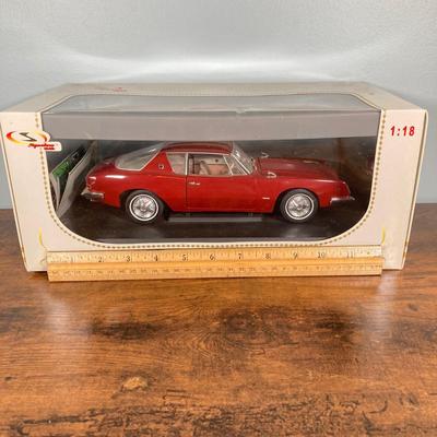 LOT 53: Diecast Collectible Cars in Original Boxes - Excellence 1965 Alfa Romero Giulia Sprint GTA and Sun Star 1963 Studebaker Avanti