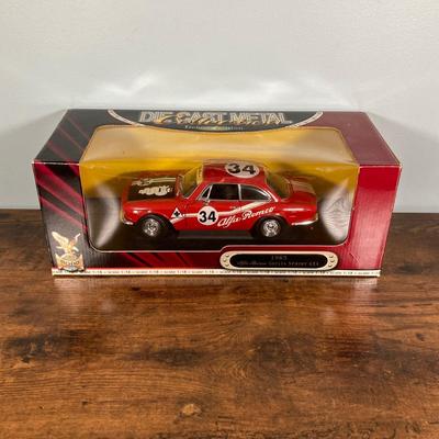 LOT 53: Diecast Collectible Cars in Original Boxes - Excellence 1965 Alfa Romero Giulia Sprint GTA and Sun Star 1963 Studebaker Avanti