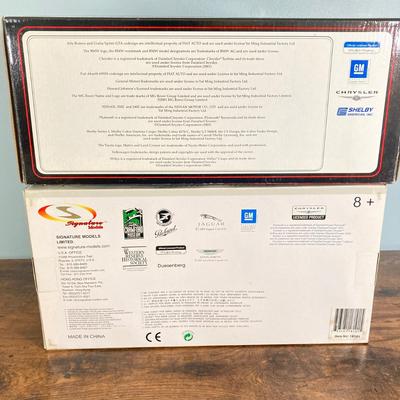 LOT 53: Diecast Collectible Cars in Original Boxes - Excellence 1965 Alfa Romero Giulia Sprint GTA and Sun Star 1963 Studebaker Avanti