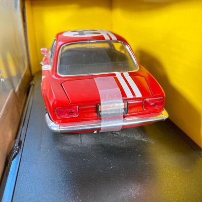 LOT 53: Diecast Collectible Cars in Original Boxes - Excellence 1965 Alfa Romero Giulia Sprint GTA and Sun Star 1963 Studebaker Avanti