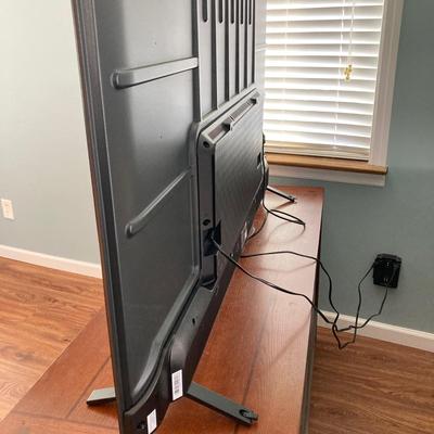 LOT 57: 65 Inch Toshiba Fire TV Model No. 65C350LU LED LCD Television with Sound Bar and Remotes