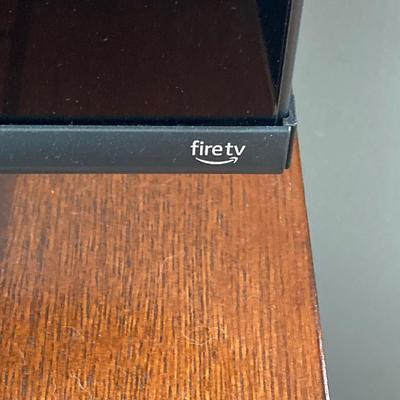 LOT 57: 65 Inch Toshiba Fire TV Model No. 65C350LU LED LCD Television with Sound Bar and Remotes