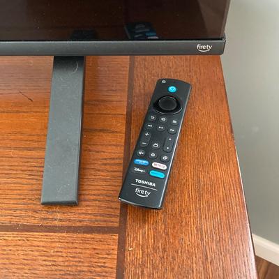 LOT 57: 65 Inch Toshiba Fire TV Model No. 65C350LU LED LCD Television with Sound Bar and Remotes