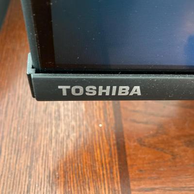 LOT 57: 65 Inch Toshiba Fire TV Model No. 65C350LU LED LCD Television with Sound Bar and Remotes