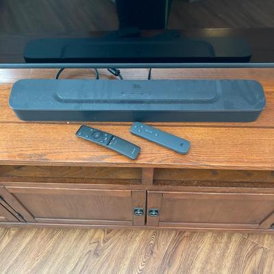 LOT 57: 65 Inch Toshiba Fire TV Model No. 65C350LU LED LCD Television with Sound Bar and Remotes