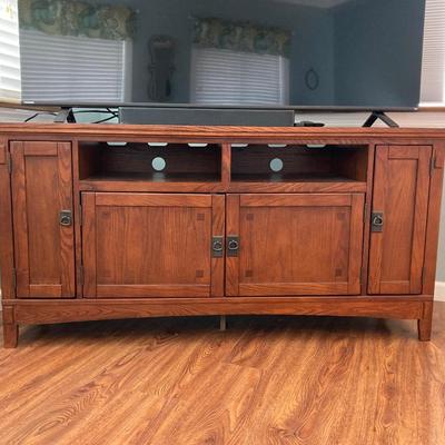 LOT 58: 60 Inch Wood TV Stand / Entertainment Cabinet with Storage