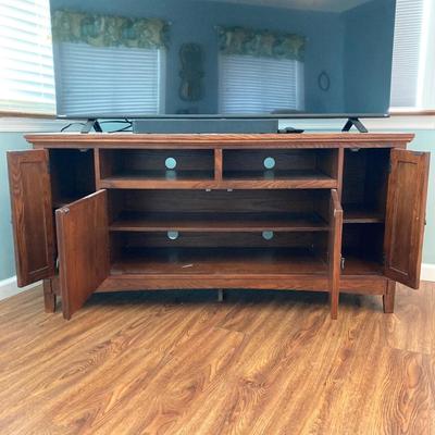 LOT 58: 60 Inch Wood TV Stand / Entertainment Cabinet with Storage