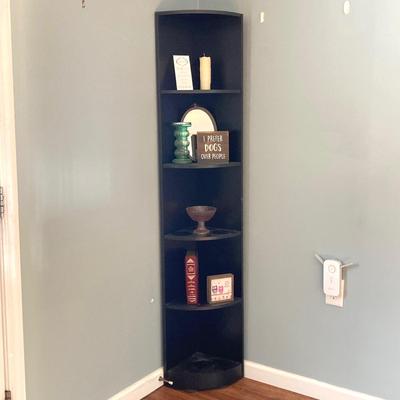 LOT 63: Black Corner Shelf Unit with Home Decor - Mirror, Candle Holder, Pink Glass Bowl, Sir Arthur Conan Doyle Book and More