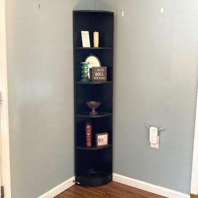 LOT 63: Black Corner Shelf Unit with Home Decor - Mirror, Candle Holder, Pink Glass Bowl, Sir Arthur Conan Doyle Book and More
