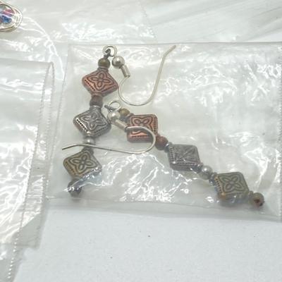 LOT 76: Eighteen Pairs of Earrings - Handcrafted, Dangle and More