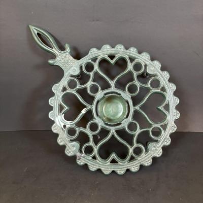 LOT 94: Vintage Family Tree Cast Iron Trivets, Vintage Black Cast Iron Footed T-15 Butterfly Trivet & a Green Enamel Old Dutch Design...