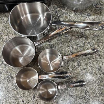 LOT 100: Kitchen Cabinet Finds: Baking Pans, Pampered Chef Glass Mixing Pitcher, Braun Turbo Handheld Mixer, All-Clad Measuring Cups...
