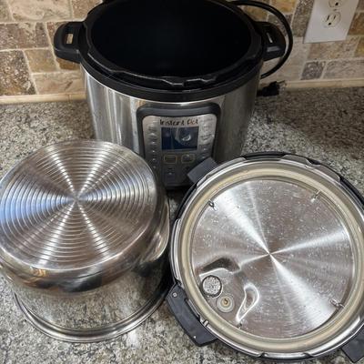 LOT 105: Instant Pot Pressure Cooker