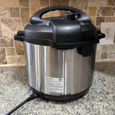 LOT 105: Instant Pot Pressure Cooker