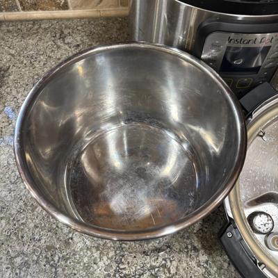 LOT 105: Instant Pot Pressure Cooker