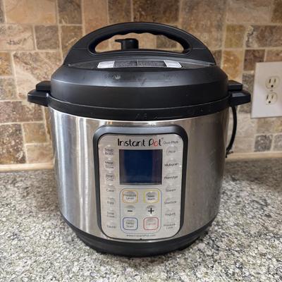 LOT 105: Instant Pot Pressure Cooker