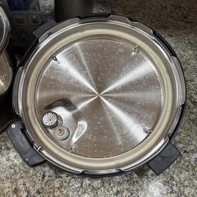 LOT 105: Instant Pot Pressure Cooker