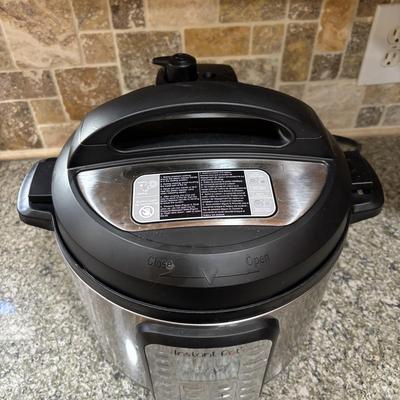 LOT 105: Instant Pot Pressure Cooker
