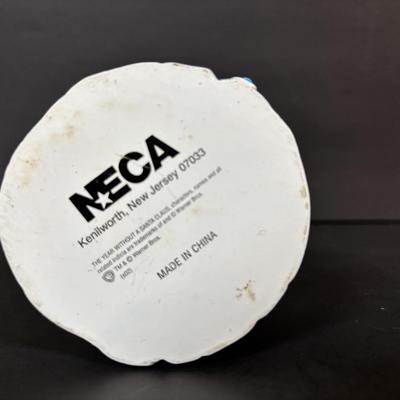 LOT 112: Holiday Collectibles: Miniature Peanuts Book & Charlie Brown Tree, NECA Snow Miser Bobble Head, Disney Ornaments, Gourd...