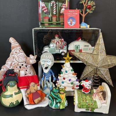 LOT 112: Holiday Collectibles: Miniature Peanuts Book & Charlie Brown Tree, NECA Snow Miser Bobble Head, Disney Ornaments, Gourd...