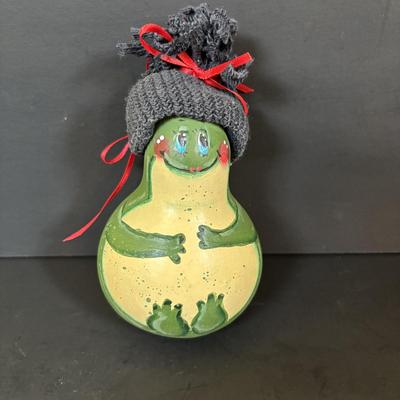 LOT 112: Holiday Collectibles: Miniature Peanuts Book & Charlie Brown Tree, NECA Snow Miser Bobble Head, Disney Ornaments, Gourd...