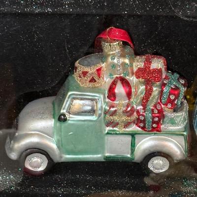 LOT 112: Holiday Collectibles: Miniature Peanuts Book & Charlie Brown Tree, NECA Snow Miser Bobble Head, Disney Ornaments, Gourd...