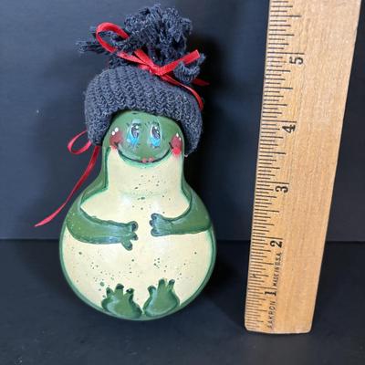 LOT 112: Holiday Collectibles: Miniature Peanuts Book & Charlie Brown Tree, NECA Snow Miser Bobble Head, Disney Ornaments, Gourd...