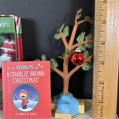LOT 112: Holiday Collectibles: Miniature Peanuts Book & Charlie Brown Tree, NECA Snow Miser Bobble Head, Disney Ornaments, Gourd...