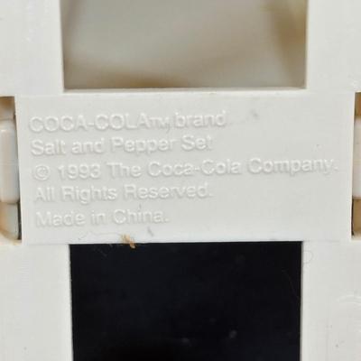 LOT 114: Black & White Framed Photos of Store Fronts, Ande Rooney Metal Sign, Coca-Cola Glasses, 1993 Coca-Cola Vending Machine...