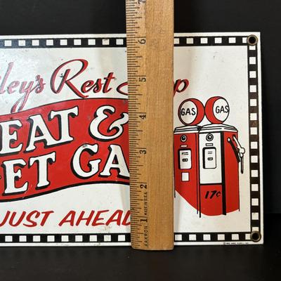 LOT 114: Black & White Framed Photos of Store Fronts, Ande Rooney Metal Sign, Coca-Cola Glasses, 1993 Coca-Cola Vending Machine...