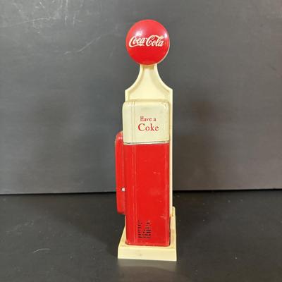 LOT 114: Black & White Framed Photos of Store Fronts, Ande Rooney Metal Sign, Coca-Cola Glasses, 1993 Coca-Cola Vending Machine...